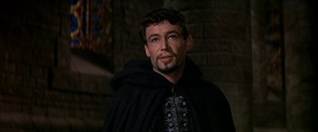 Movie still from “Becket” (1964), directed by Peter Glenville – A person wearing a cape; Close Up shot, Over the shoulder angle