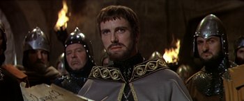 Movie still from “Becket” (1964), directed by Peter Glenville – A person wearing a costume; Close Up shot, Over the shoulder angle