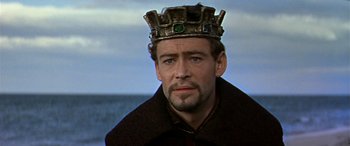 Movie still from “Becket” (1964), directed by Peter Glenville – A person wearing a crown; Close Up shot, Over the shoulder angle