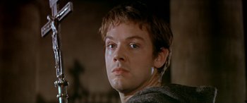 Movie still from “Becket” (1964), directed by Peter Glenville – A person wearing a sweater; Close Up shot, Low angle