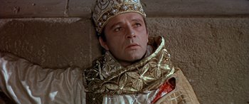 Movie still from “Becket” (1964), directed by Peter Glenville – A person wearing a crown; Close Up shot, High angle