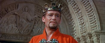 Movie still from “Becket” (1964), directed by Peter Glenville – A person wearing a crown; Close Up shot, Low angle