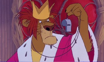 Movie still from “Bedknobs and Broomsticks” (1971), directed by Ward Kimball – A cartoon picture of a lion wearing a crown; Close Up shot, Low angle