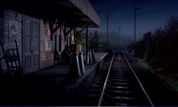Movie still from “Bedknobs and Broomsticks” (1971), directed by Ward Kimball – A train station at night with people sitting on a bench; Extreme Wide shot, High angle