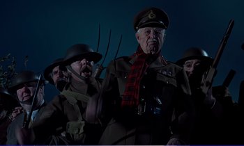 Movie still from “Bedknobs and Broomsticks” (1971), directed by Ward Kimball – A group of men dressed in military uniforms; Medium shot, Low angle