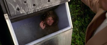 Movie still from “Bedtime Stories” (2008), directed by Adam Shankman – A young girl looking out of an open window; Medium shot, Low angle