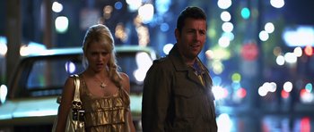 Movie still from “Bedtime Stories” (2008), directed by Adam Shankman – A man and a woman standing next to each other on the street; Close Up shot, Over the shoulder angle