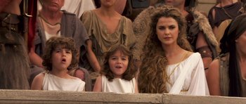 Movie still from “Bedtime Stories” (2008), directed by Adam Shankman – Two women and a girl in a crowd of people; Close Up shot, High angle