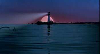 Movie still from “Before Sunset” (2004), directed by Richard Linklater – A light house on a body of water at sunset; Extreme Wide shot, Low angle
