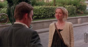 Movie still from “Before Sunset” (2004), directed by Richard Linklater – A man and a woman are standing on the sidewalk; Medium shot, Over the shoulder angle