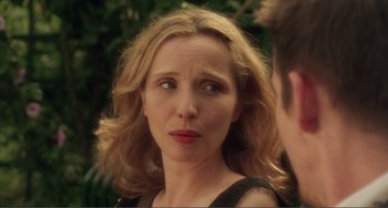 Movie still from “Before Sunset” (2004), directed by Richard Linklater – A person looking at the camera; Close Up shot, Over the shoulder angle