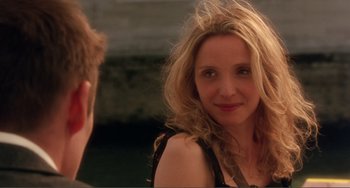 Movie still from “Before Sunset” (2004), directed by Richard Linklater – A person talking to another person; Close Up shot, Over the shoulder angle