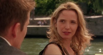 Movie still from “Before Sunset” (2004), directed by Richard Linklater – A woman is talking to a man on a boat; Close Up shot, Over the shoulder angle