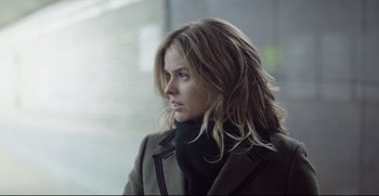 Movie still from “Before We Go” (2014), directed by Chris Evans – A woman with long blonde hair wearing a coat; Close Up shot, Over the shoulder angle