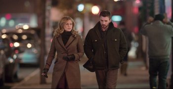 Movie still from “Before We Go” (2014), directed by Chris Evans – A man and a woman walking down a street at night; Medium shot, Over the shoulder angle