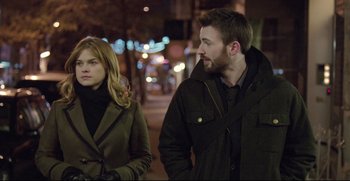 Movie still from “Before We Go” (2014), directed by Chris Evans – A man and a woman walking down a street at night; Medium shot, Over the shoulder angle
