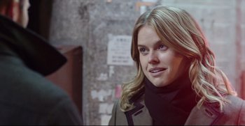 Movie still from “Before We Go” (2014), directed by Chris Evans – A beautiful blonde woman wearing a black scarf; Close Up shot, Over the shoulder angle