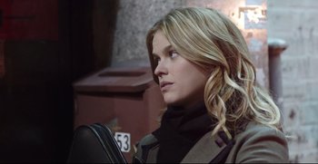 Movie still from “Before We Go” (2014), directed by Chris Evans – A woman with long blonde hair looking to her left; Close Up shot, Over the shoulder angle