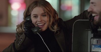 Movie still from “Before We Go” (2014), directed by Chris Evans – A woman smiles as she talks on the phone; Close Up shot, Low angle