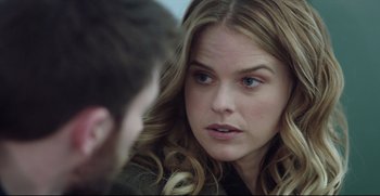 Movie still from “Before We Go” (2014), directed by Chris Evans – A person sitting down with another person; Close Up shot, Over the shoulder angle