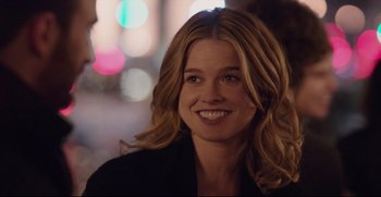 Movie still from “Before We Go” (2014), directed by Chris Evans – A person with long blonde hair; Close Up shot, Over the shoulder angle