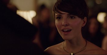 Movie still from “Before We Go” (2014), directed by Chris Evans – A person wearing a necklace; Close Up shot, Over the shoulder angle