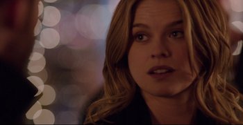 Movie still from “Before We Go” (2014), directed by Chris Evans – A person with long hair; Close Up shot, Over the shoulder angle