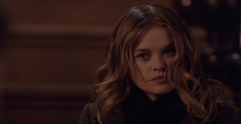 Movie still from “Before We Go” (2014), directed by Chris Evans – A person with long brown hair; Close Up shot, Over the shoulder angle