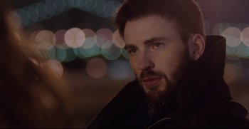 Movie still from “Before We Go” (2014), directed by Chris Evans – A person wearing a jacket; Close Up shot, Over the shoulder angle