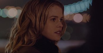 Movie still from “Before We Go” (2014), directed by Chris Evans – A person with long blonde hair; Close Up shot, Over the shoulder angle