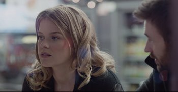 Movie still from “Before We Go” (2014), directed by Chris Evans – A woman with long blonde hair is looking to her left; Close Up shot, Over the shoulder angle