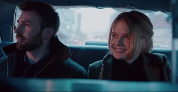Movie still from “Before We Go” (2014), directed by Chris Evans – A man and a woman sitting in the back of a car; Close Up shot, Over the shoulder angle