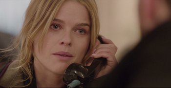 Movie still from “Before We Go” (2014), directed by Chris Evans – A person talking on a phone; Close Up shot, Over the shoulder angle