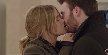 Movie still from “Before We Go” (2014), directed by Chris Evans – A man and a woman kissing each other; Close Up shot, Low angle