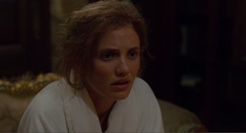 Movie still from “Being John Malkovich” (1999), directed by Spike Jonze – A person wearing a white shirt; Close Up shot, Over the shoulder angle