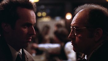 Movie still from “Being There” (1979), directed by Hal Ashby – A man and a woman talking to each other; Close Up shot, Over the shoulder angle