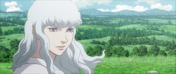 A woman with white hair in a field
