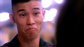 Movie still from “Better Luck Tomorrow” (2002), directed by Justin Lin – A person with his mouth wide open; Close Up shot, Over the shoulder angle