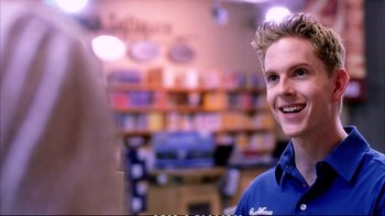 Movie still from “Better Luck Tomorrow” (2002), directed by Justin Lin – A man in a blue shirt smiles for the camera; Close Up shot, Over the shoulder angle