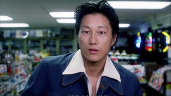 Movie still from “Better Luck Tomorrow” (2002), directed by Justin Lin – A person wearing a jacket; Close Up shot, Low angle