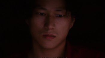 Movie still from “Better Luck Tomorrow” (2002), directed by Justin Lin – A young man is looking into the camera; Close Up shot, Low angle