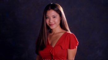 Movie still from “Better Luck Tomorrow” (2002), directed by Justin Lin – A beautiful young lady in a red dress; Close Up shot, High angle