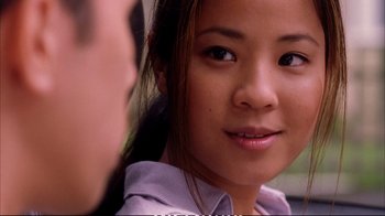 Movie still from “Better Luck Tomorrow” (2002), directed by Justin Lin – A young woman's face; Close Up shot, Over the shoulder angle