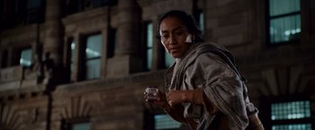 Movie still from “Beverly Hills Chihuahua” (2008), directed by Raja Gosnell – A woman holding a glass in her hand; Medium shot, Low angle