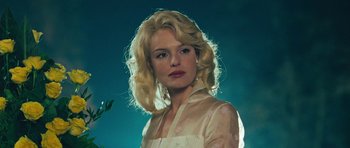 Movie still from “Beyond the Sea” (2004), directed by Kevin Spacey – A woman with blonde hair wearing a white dress; Close Up shot, Low angle