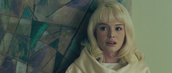 Movie still from “Beyond the Sea” (2004), directed by Kevin Spacey – A woman with blonde hair and a white dress; Close Up shot, Overhead angle
