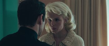 Movie still from “Beyond the Sea” (2004), directed by Kevin Spacey – A man and a woman looking at one another in a mirror; Close Up shot, Over the shoulder angle