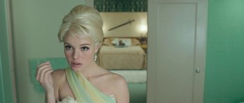 Movie still from “Beyond the Sea” (2004), directed by Kevin Spacey – A woman with blonde hair wearing a white dress; Close Up shot, Over the shoulder angle