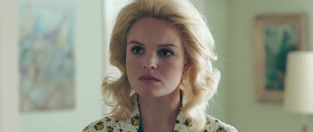 Movie still from “Beyond the Sea” (2004), directed by Kevin Spacey – A person with blonde hair; Close Up shot, Over the shoulder angle