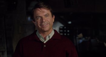 Movie still from “Bicentennial Man” (1999), directed by Chris Columbus – A person wearing a red sweater; Close Up shot, Over the shoulder angle